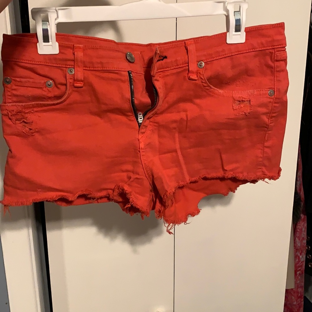 Dark coral distressed shorts